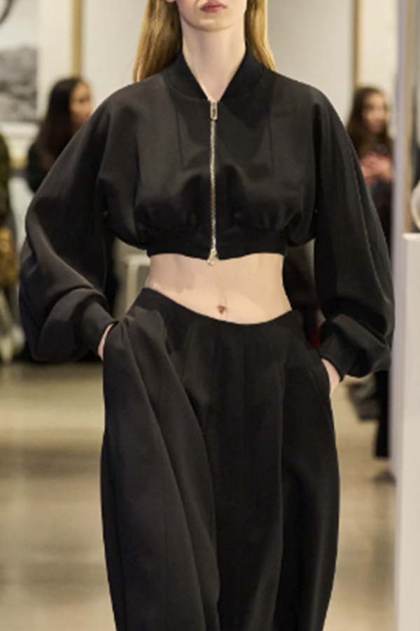 Ashlyn perfect Bomber. Ashlyn Regular fit bomber jacket. Ashlyn slightly oversized jacket. Ashlyn cropped silhouette bomber. Ashlyn stand collar bomber. Ashlyn cuff sleeved bomber. Ashlyn cropped silhouette. Ashlyn bomber with luxurious zipper. Ashlyn Viscose Bomber. Ashlyn black bomber jacket. Ashlyn cropped black bomber jacket. Des Kohan Los Angeles Ashlyn. Ashlyn exclusive Des Kohan. Ashlyn West Hollywood. Ashlyn Des Kohan.