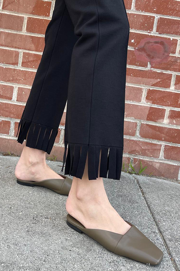 High Sport Fringed Louis Pant. High Sport Black Pant. High Sport Noir Pant. High Sport Soft knit in Italian cotton. High Sport Knit in Italy. Cousin to the classic High Spot Kick Pant. High Sport Pull-on pant. High Sport Slender fit. Black High Sport Fringe detail at ankle. High Sport Subtle Jacquard Print. 
High Sport Versatile Excellent fit Day to Night Exceptional quality Timeless. Made in Italy. Designed in Los Angeles. High Sport Los Angeles. Des Kohan Boutique High Sport. High Sport West Hollywood. 