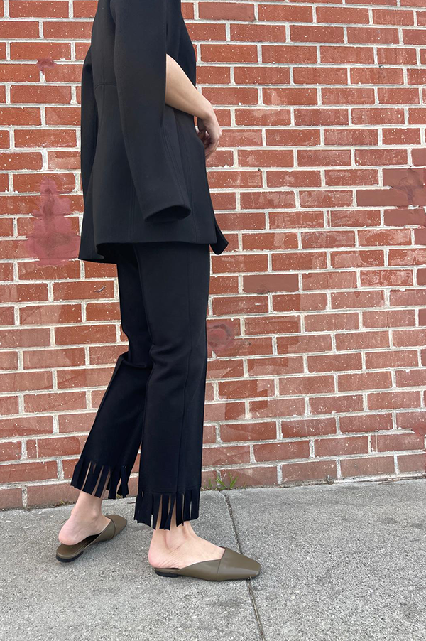High Sport Fringed Louis Pant. High Sport Black Pant. High Sport Noir Pant. High Sport Soft knit in Italian cotton. High Sport Knit in Italy. Cousin to the classic High Spot Kick Pant. High Sport Pull-on pant. High Sport Slender fit. Black High Sport Fringe detail at ankle. High Sport Subtle Jacquard Print. 
High Sport Versatile Excellent fit Day to Night Exceptional quality Timeless. Made in Italy. Designed in Los Angeles. High Sport Los Angeles. Des Kohan Boutique High Sport. High Sport West Hollywood. 