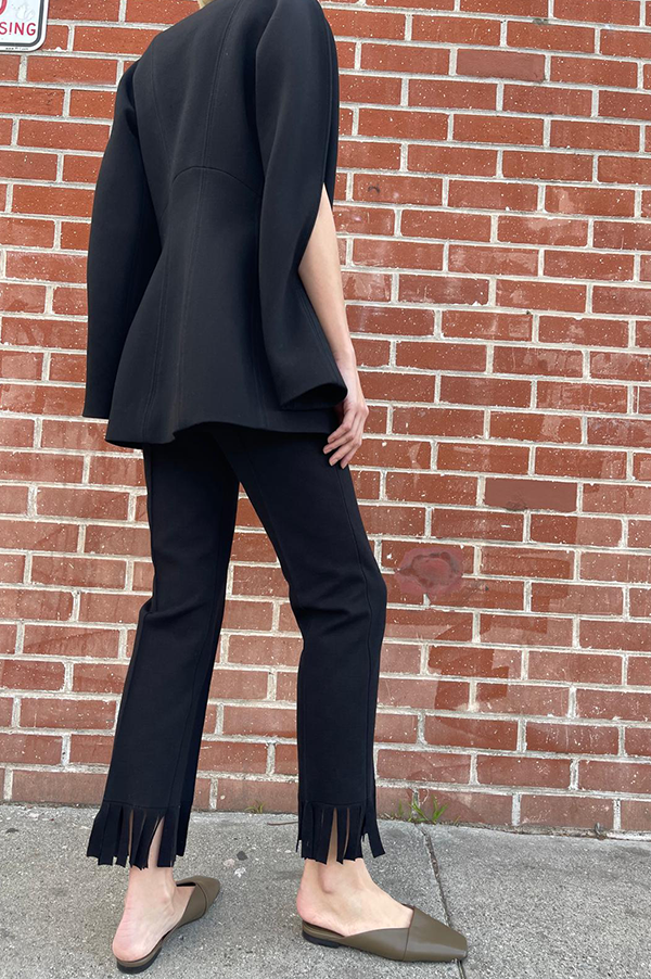 High Sport Fringed Louis Pant. High Sport Black Pant. High Sport Noir Pant. High Sport Soft knit in Italian cotton. High Sport Knit in Italy. Cousin to the classic High Spot Kick Pant. High Sport Pull-on pant. High Sport Slender fit. Black High Sport Fringe detail at ankle. High Sport Subtle Jacquard Print. 
High Sport Versatile Excellent fit Day to Night Exceptional quality Timeless. Made in Italy. Designed in Los Angeles. High Sport Los Angeles. Des Kohan Boutique High Sport. High Sport West Hollywood. 