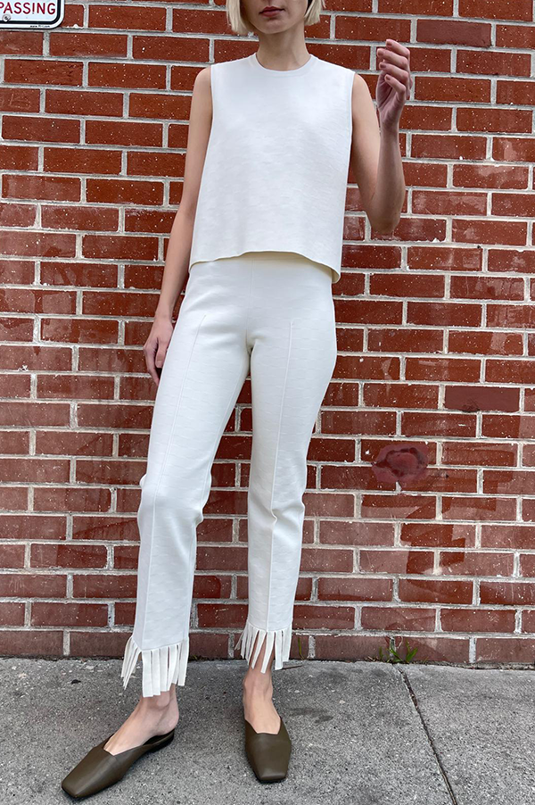High Sport Fringed Louis Pant. High Sport Ecru Pant. High Sport Light Cream. High Sport Soft knit in Italian cotton. High Sport Knit in Italy. Cousin to the classic High Spot Kick Pant. High Sport Pull-on pant. High Sport Slender fit. High Sport Fringe detail at ankle. High Sport Subtle Jacquard Print. 
High Sport Versatile Excellent fit Day to Night Exceptional quality Timeless. Made in Italy. Designed in Los Angeles. High Sport Los Angeles. Des Kohan Boutique High Sport. High Sport West Hollywood. 